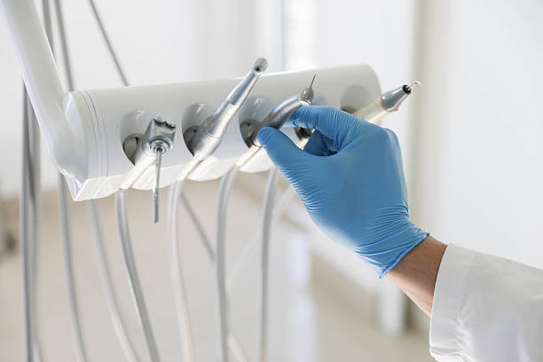 Professional Root Canal Treatment technician working in Mangum, OK